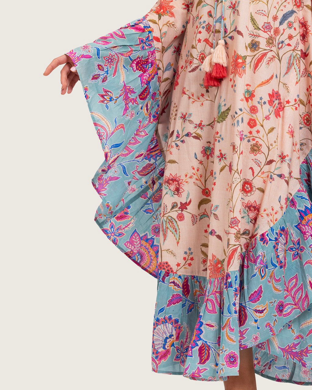 A flowy cotton kaftan with ruffle wide sleeves and mix print