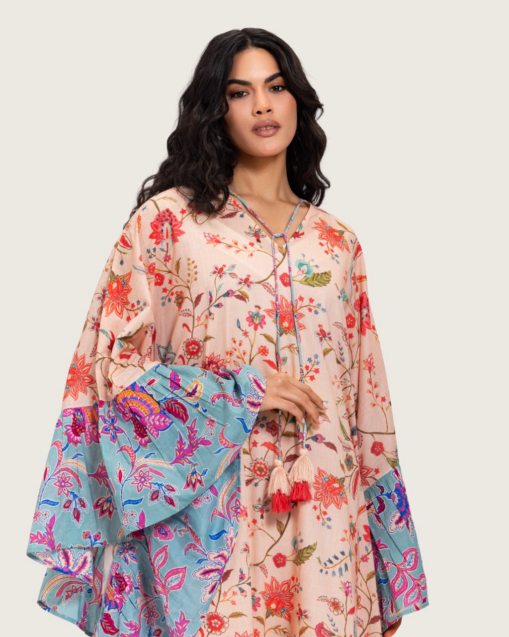 A flowy cotton kaftan with ruffle wide sleeves and mix print