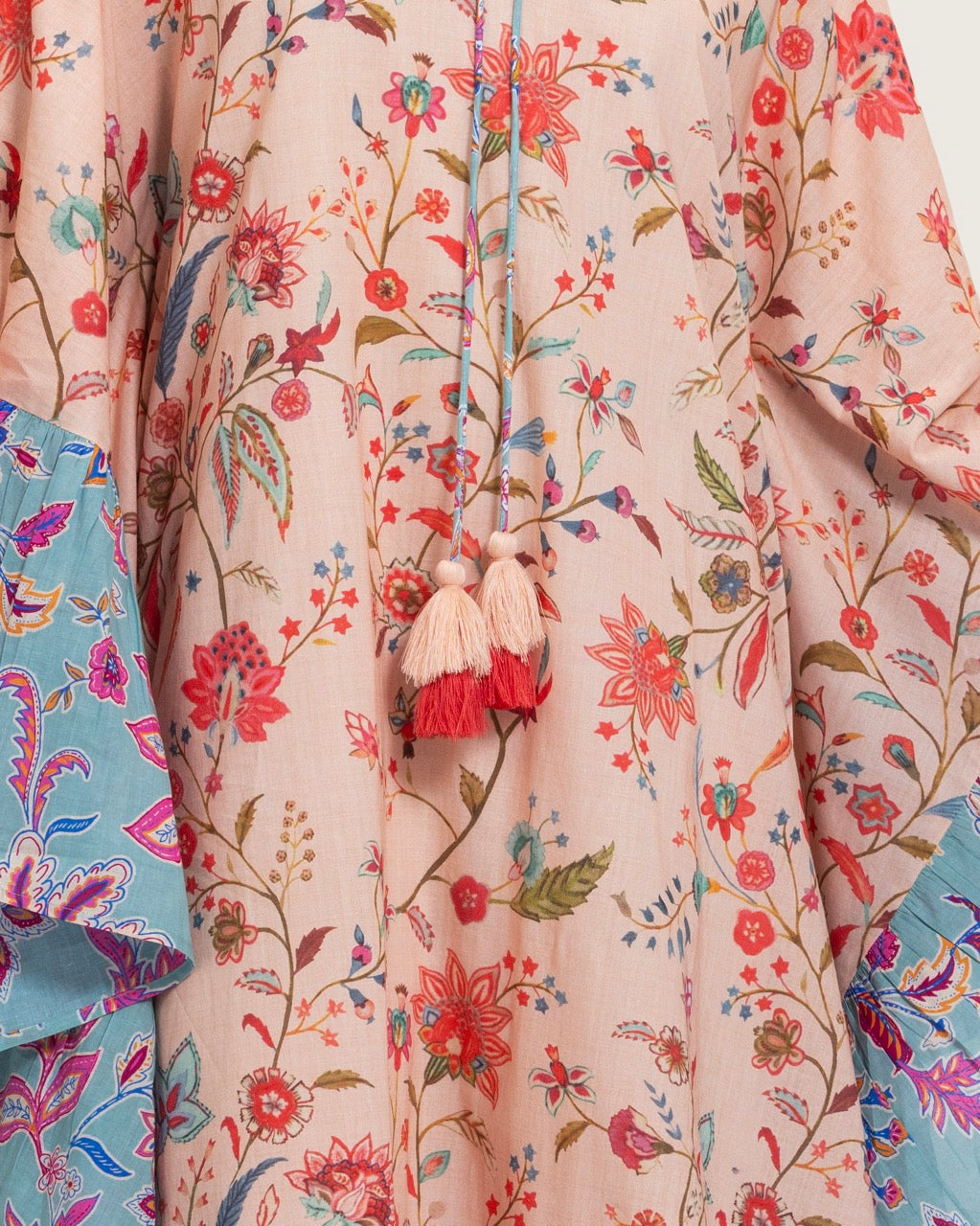 A flowy cotton kaftan with ruffle wide sleeves and mix print