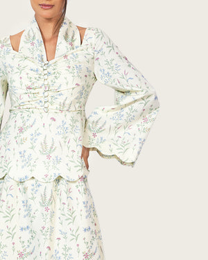 فستان كتان مزهر بتفاصيل حواف صدفية