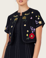 فستان أسود مطرز مع جاكيت قصير