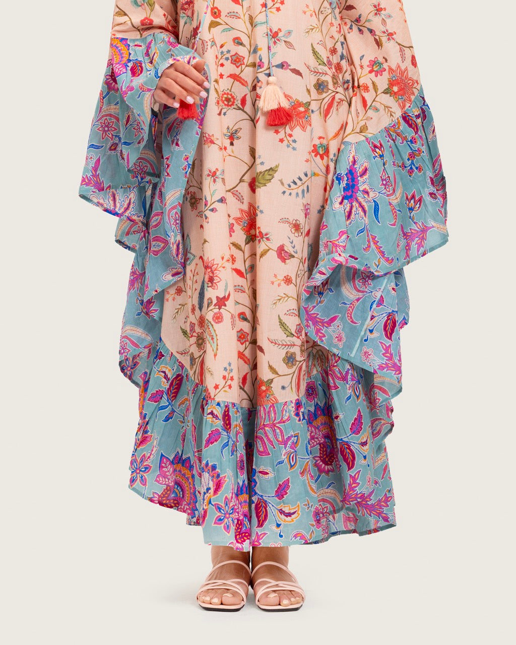 A flowy cotton kaftan with ruffle wide sleeves and mix print