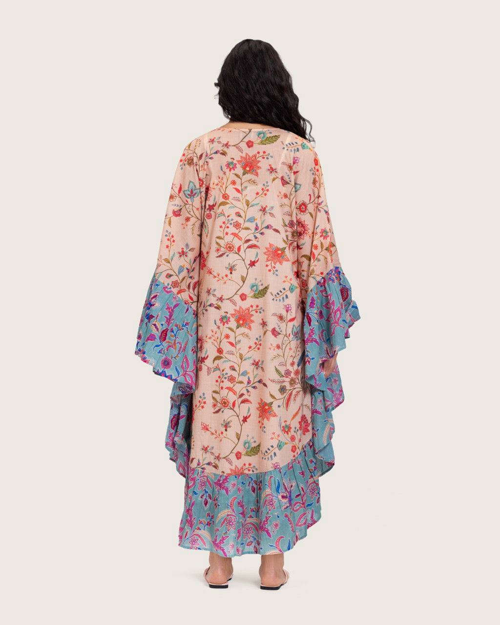 A flowy cotton kaftan with ruffle wide sleeves and mix print