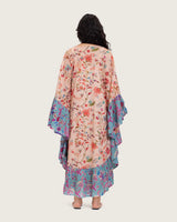 A flowy cotton kaftan with ruffle wide sleeves and mix print