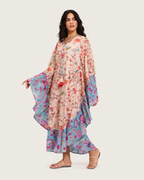 A flowy cotton kaftan with ruffle wide sleeves and mix print