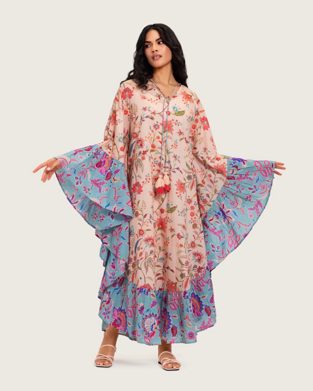 A flowy cotton kaftan with ruffle wide sleeves and mix print