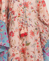 A flowy cotton kaftan with ruffle wide sleeves and mix print