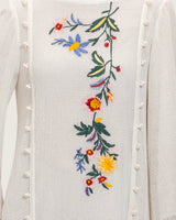 فستان ماكسي سكري بتطريز زهري وحواف مزينة