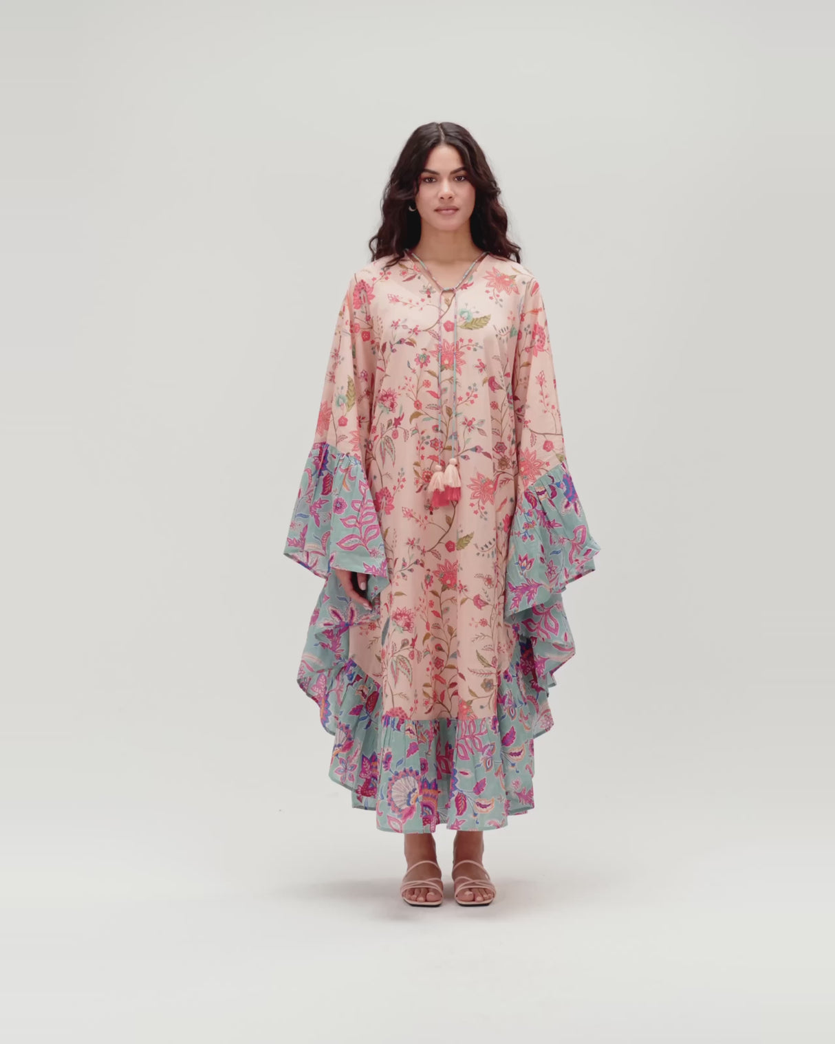 A flowy cotton kaftan with ruffle wide sleeves and mix print