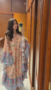 A flowy cotton kaftan with ruffle wide sleeves and mix print