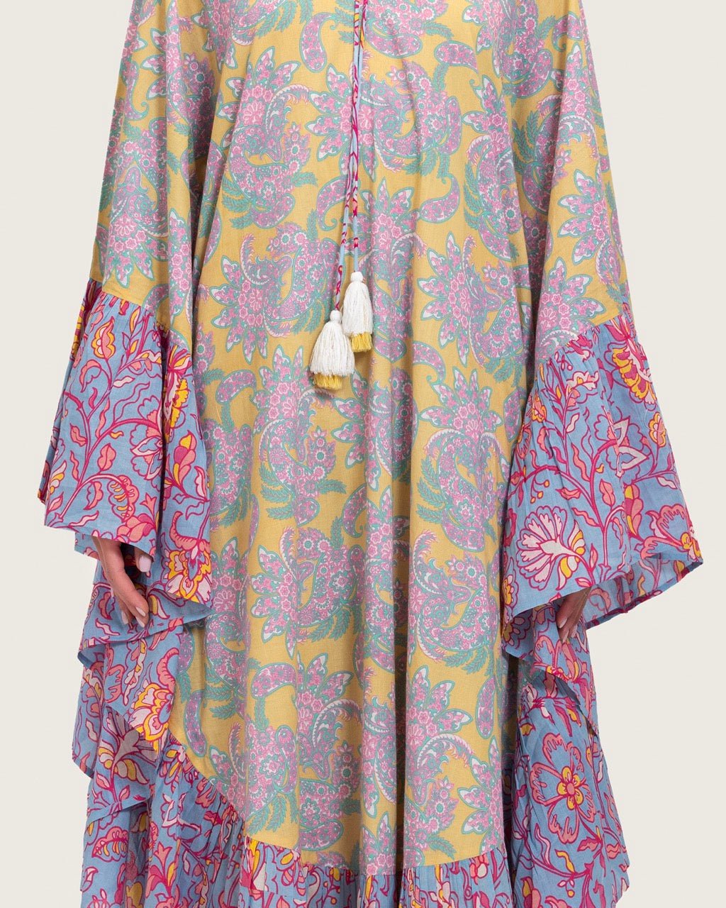Printed Flowy Kaftan Dress with Soft Multicolor Motifs and Tassels - Noētic