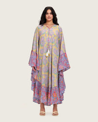 Printed Flowy Kaftan Dress with Soft Multicolor Motifs and Tassels - Noētic