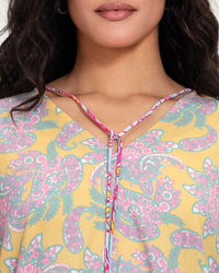 Printed Flowy Kaftan Dress with Soft Multicolor Motifs and Tassels - Noētic