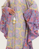 Printed Flowy Kaftan Dress with Soft Multicolor Motifs and Tassels - Noētic